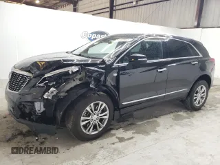 2023 Cadillac XT5 FWD Premium Luxury with VIN 1GYKNCRS6PZ171335, listed as a Copart auction lot 51859385 with 52,691 mi miles and Clean Title. Bid and sale history available at carsss.com. Image 1.