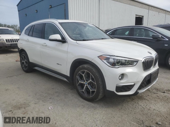 2017 BMW X1 xDrive28i with VIN WBXHT3C32H5F81474, listed as a Copart auction lot 55238895 with 86,264 mi miles and Salvage Title. Bid and sale history available at DreamBid. Image 4.