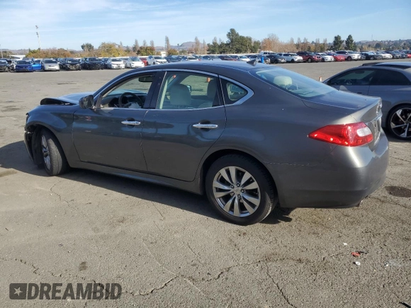 2012 Infiniti M37 with VIN JN1BY1AP8CM333839, listed as a Copart auction lot 84052134 with 121,979 mi miles and Salvage Title. Bid and sale history available at carsss.com. Image 2.