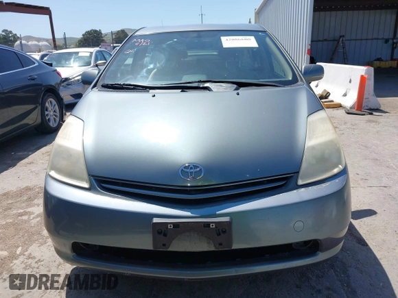 2004 Toyota Prius with VIN JTDKB20U840035148, listed as a IAAI auction lot 42086608 with 87,207 mi miles and . Bid and sale history available at DreamBid. Image 12.