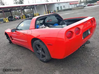 2004 Chevrolet Corvette with VIN 1G1YY22G545121321, listed as a IAAI auction lot 41601136 with 1 mi miles. Bid and sale history available at carsss.com. Image 3.