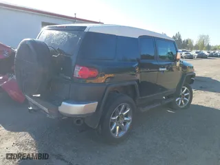 2008 Toyota FJ Cruiser with VIN JTEBU11F780104062, listed as a IAAI auction lot 41010076 with 220,975 mi miles. Bid and sale history available at carsss.com. Image 4.