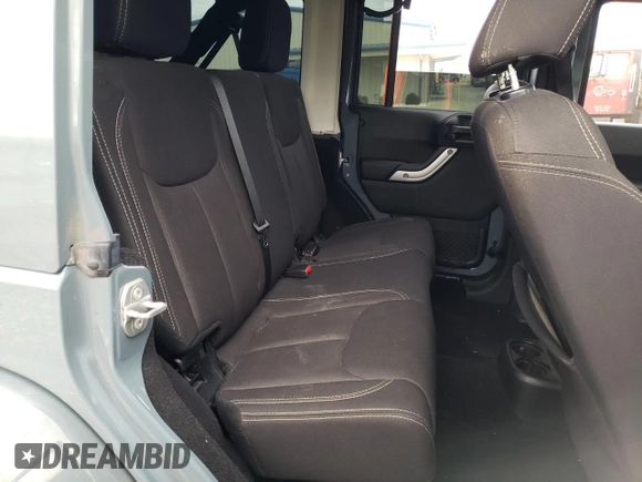 2015 Jeep Wrangler Unlimited Sahara with VIN 1C4BJWEG6FL640316, listed as a Copart auction lot 48024865 with 128,317 mi miles and Salvage Title. Bid and sale history available at carsss.com. Image 11.