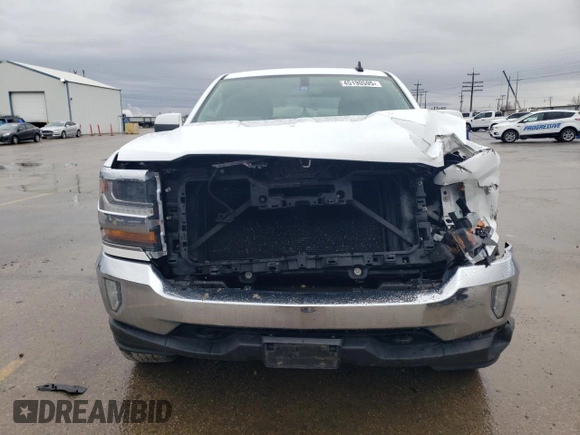 2016 Chevrolet Silverado 1500 LT with VIN 1GCUKREC7GF168602, listed as a Copart auction lot 45190595 with 77,724 mi miles and Salvage Title. Bid and sale history available at DreamBid. Image 5.