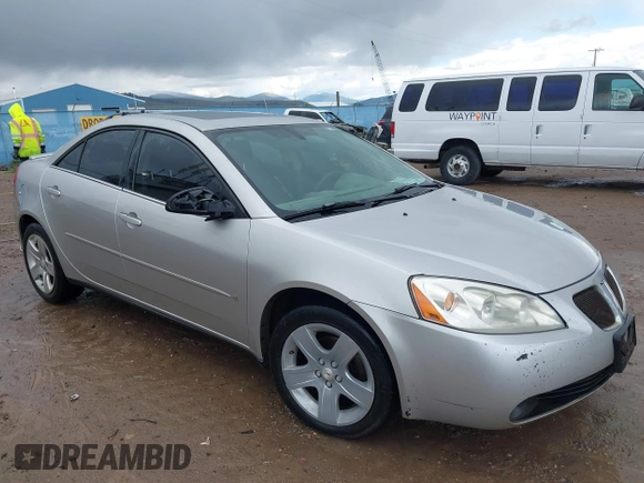 2006 Pontiac G6 6-Cyl z VIN 1G2ZG558364252569, wystawiony jako IAAI lot #40725811 z przebiegiem 183 079 mil mil oraz . Historia ofert i sprzedaży dostępna na DreamBid. Obrazek 1.