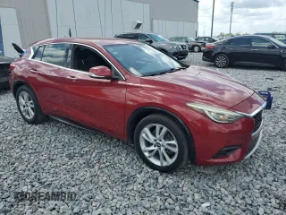 2017 Infiniti QX30 Premium with VIN SJKCH5CP1HA039923, listed as a Copart auction lot 52682745 with 132,947 mi miles and Clean Title. Bid and sale history available at DreamBid. Image 4.