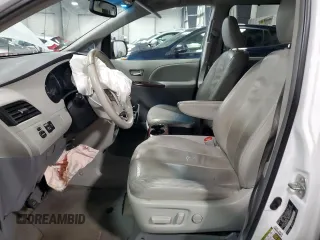 2013 Toyota Sienna XLE AAS with VIN 5TDYK3DC9DS330919, listed as a Copart auction lot 59094495 with 147,638 mi miles and Salvage title. Bid and sale history available at DreamBid. Image 7.