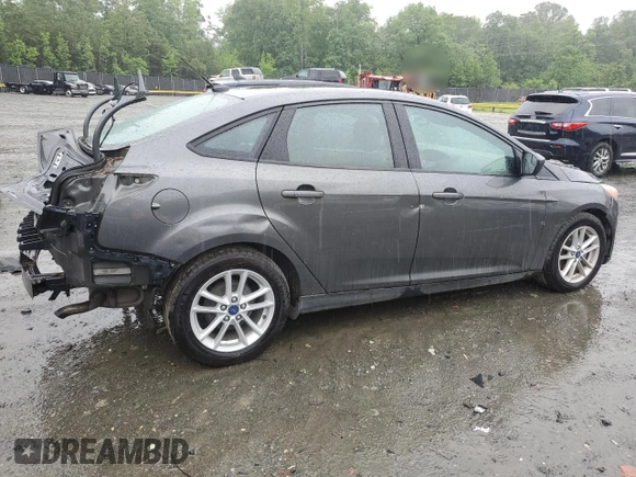 2018 Ford Focus SE z VIN 1FADP3F21JL285417, wystawiony jako Copart lot #56936965 z przebiegiem Nie podano mil oraz Czysty tytuł • Clean title. Historia ofert i sprzedaży dostępna na DreamBid. Obrazek 3.