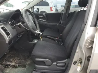 2006 Suzuki Aerio Premium z VIN JS2RC62H265351207, wystawiony jako Copart lot #74980534 z przebiegiem 64 199 mil mil oraz Nie do naprawy. Historia ofert i sprzedaży dostępna na DreamBid. Obrazek 7.