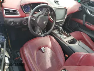 2017 Maserati Ghibli z VIN ZAM57XSA7H1221497, wystawiony jako Copart lot #51850845 z przebiegiem Nie podano mil oraz Tytuł czysty. Historia ofert i sprzedaży dostępna na DreamBid. Obrazek 8.