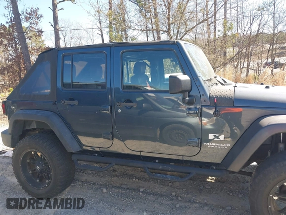 2008 Jeep Wrangler Unlimited X with VIN 1J4GB39138L589300, listed as a IAAI auction lot 41671690 with Not Provided miles and . Bid and sale history available at DreamBid. Image 13.