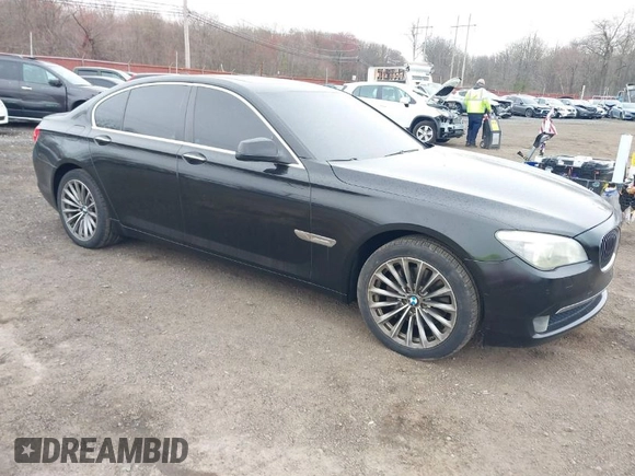 2011 BMW 7 Series 740i with VIN WBAKA4C55BC612584, listed as a IAAI auction lot 42021367 with 139,190 mi miles. Bid and sale history available at carsss.com. Image 1.