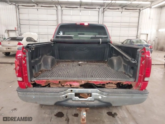 2000 Ford F-150 XL with VIN 1FTRX18L0YNA84231, listed as a IAAI auction lot 41824453 with 223,642 mi miles. Bid and sale history available at carsss.com. Image 6.