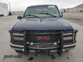 1999 GMC Suburban with VIN 1GDFK16R9XJ771458, listed as a Copart auction lot 43412175 with 159,328 mi miles and Salvage Title. Bid and sale history available at carsss.com. Image 5.