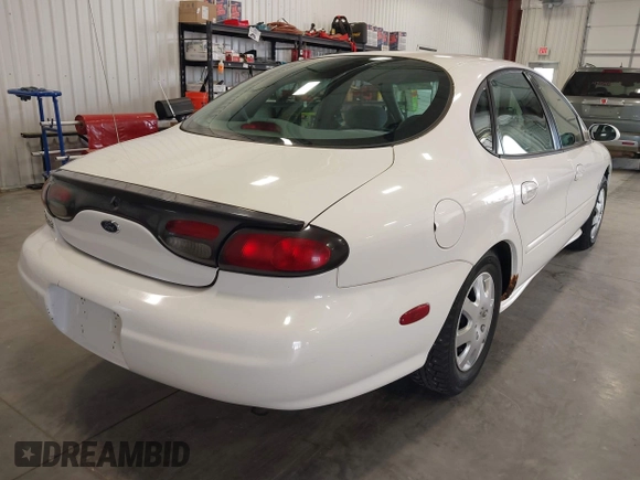 1998 Ford Taurus z VIN 1FAFP52S1WA120013, wystawiony jako IAAI lot #41987332 z przebiegiem 179 500 mil mil oraz . Historia ofert i sprzedaży dostępna na DreamBid. Obrazek 4.