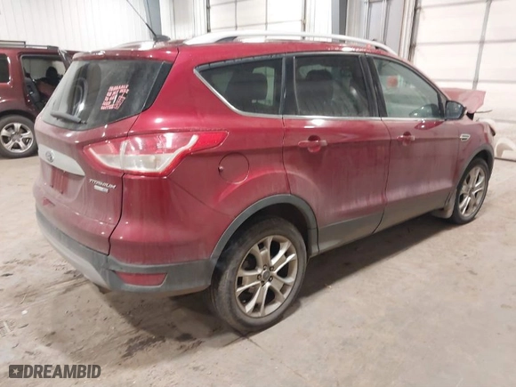 2014 Ford Escape Titanium with VIN 1FMCU9JX0EUC76045, listed as a IAAI auction lot 41119637 with 105,000 mi miles. Bid and sale history available at carsss.com. Image 4.