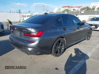 2021 BMW 3 Series 330i z VIN 3MW5R1J08M8B94401, wystawiony jako IAAI lot #41760747 z przebiegiem Nie podano mil oraz . Historia ofert i sprzedaży dostępna na DreamBid. Obrazek 4.