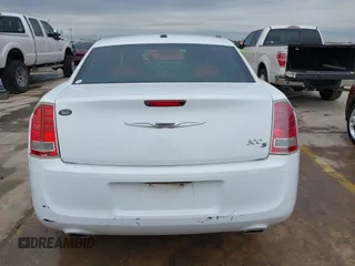 2013 Chrysler 300 with VIN 2C3CCABGXDH735739, listed as a IAAI auction lot 41282492 with 121,487 mi miles. Bid and sale history available at carsss.com. Image 17.