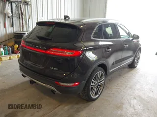 2015 Lincoln MKC z VIN 5LMTJ1BH4FUJ32742, wystawiony jako IAAI lot #42249774 z przebiegiem 92 354 mil mil oraz . Historia ofert i sprzedaży dostępna na DreamBid. Obrazek 4.