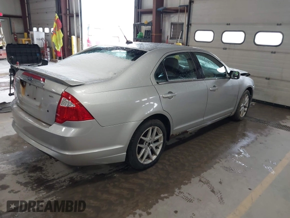 2010 Ford Fusion SEL with VIN 3FAHP0JA6AR427888, listed as a IAAI auction lot 41853215 with 186,581 mi miles. Bid and sale history available at carsss.com. Image 4.