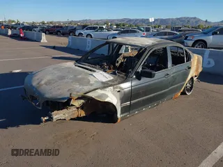 2003 BMW 3 Series 325i with VIN WBAEV33453KL59339, listed as a IAAI auction lot 40752095 with Not Provided miles and . Bid and sale history available at DreamBid. Image 2.