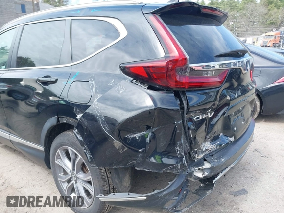 2020 Honda CR-V Touring with VIN 7FART6H96LE023782, listed as a IAAI auction lot 42053948 with 56,814 mi miles and . Bid and sale history available at DreamBid. Image 17.