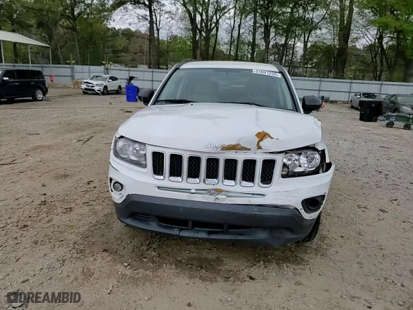 2014 Jeep Compass Sport with VIN 1C4NJCBA4ED573431, listed as a Copart auction lot 51041235 with 131,064 mi miles and Salvage Title. Bid and sale history available at carsss.com. Image 14.