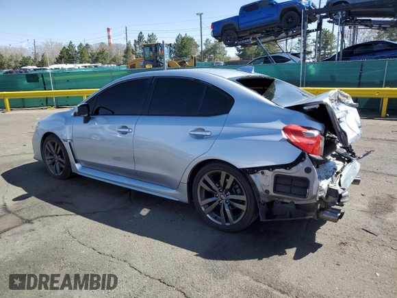 2016 Subaru WRX Limited with VIN JF1VA1J65G9818699, listed as a Copart auction lot 52116595 with 123,247 mi miles and Salvage title. Bid and sale history available at DreamBid. Image 2.