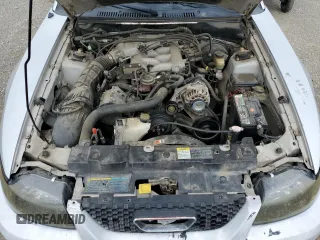 2004 Ford Mustang Deluxe с VIN 1FAFP44494F117692, выставлен на аукционе Copart как лот 56503755 с пробегом 159 917 миль миль и Списание • Salvage title. История ставок и продаж доступна на DreamBid. Изображение 11.