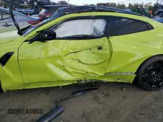 2022 BMW M4 Competition xDrive with VIN WBS43AZ01NCJ02844, listed as a Copart auction lot 74776864 with 0 mi miles and Salvage Title. Bid and sale history available at carsss.com. Image 7.