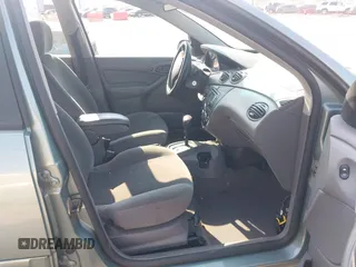 2003 Ford Focus SE with VIN 1FAFP34P33W252024, listed as a IAAI auction lot 42484082 with 125,777 mi miles and . Bid and sale history available at DreamBid. Image 5.