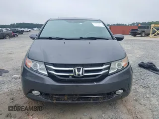 2014 Honda Odyssey Touring with VIN 5FNRL5H98EB008953, listed as a IAAI auction lot 42291179 with Not provided miles and . Bid and sale history available at DreamBid. Image 11.