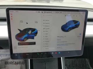 2021 Tesla Model Y Standard Range z VIN 5YJYGDED9MF110473, wystawiony jako Copart lot #53850085 z przebiegiem 46 242 mil mil oraz Szkoda całkowita • Salvage title. Historia ofert i sprzedaży dostępna na DreamBid. Obrazek 9.