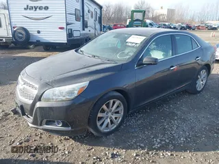 2013 Chevrolet Malibu LTZ with VIN 1G11H5SA9DF150247, listed as a IAAI auction lot 41376113 with 190,498 mi miles and . Bid and sale history available at DreamBid. Image 2.
