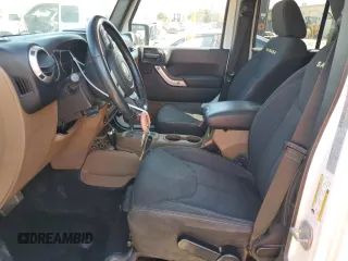 2015 Jeep Wrangler Unlimited Sahara with VIN 1C4BJWEG2FL561032, listed as a Copart auction lot 48885885 with 92,073 mi miles and Salvage Title. Bid and sale history available at carsss.com. Image 7.