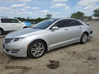 2014 Lincoln MKZ z VIN 3LN6L2JK5ER801135, wystawiony jako Copart lot #55995595 z przebiegiem 144 292 mil mil oraz Szkody całkowita. Historia ofert i sprzedaży dostępna na DreamBid. Obrazek 1.