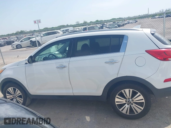2015 Kia Sportage EX with VIN KNDPC3AC9F7790737, listed as a IAAI auction lot 42021494 with 112,621 mi miles and . Bid and sale history available at DreamBid. Image 14.