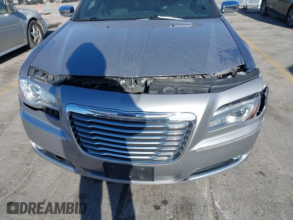 2014 Chrysler 300 C with VIN 2C3CCAKG3EH212936, listed as a IAAI auction lot 40921649 with 153,000 mi miles and . Bid and sale history available at carsss.com. Image 6.