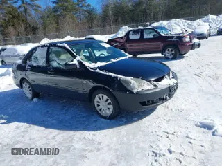 2006 Mitsubishi Lancer ES with VIN JA3AJ26E06U000385, listed as a IAAI auction lot 41587490 with 185,100 mi miles. Bid and sale history available at carsss.com. Image 1.