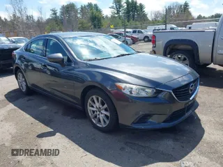 2015 Mazda Mazda6 i Sport with VIN JM1GJ1U55F1182451, listed as a IAAI auction lot 42079526 with 140,321 mi miles. Bid and sale history available at carsss.com. Image 1.