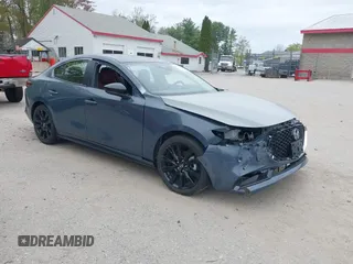 2024 Mazda 3 S Carbon Edition with VIN 3MZBPBCM1RM400557, listed as a IAAI auction lot 42157115 with 1,836 mi miles and . Bid and sale history available at DreamBid. Image 1.
