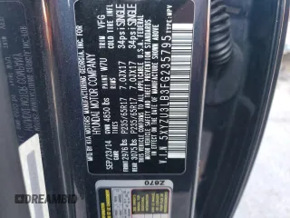 2015 Hyundai Santa Fe z VIN 5XYZU3LB3FG235795, wystawiony jako Copart lot #82047494 z przebiegiem 80 623 mil mil oraz Szkoda całkowita • Salvage title. Historia ofert i sprzedaży dostępna na DreamBid. Obrazek 13.