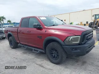 2021 Ram 1500 Warlock with VIN 1C6RR7GGXMS562367, listed as a IAAI auction lot 42657889 with 142,498 mi miles and . Bid and sale history available at DreamBid. Image 1.