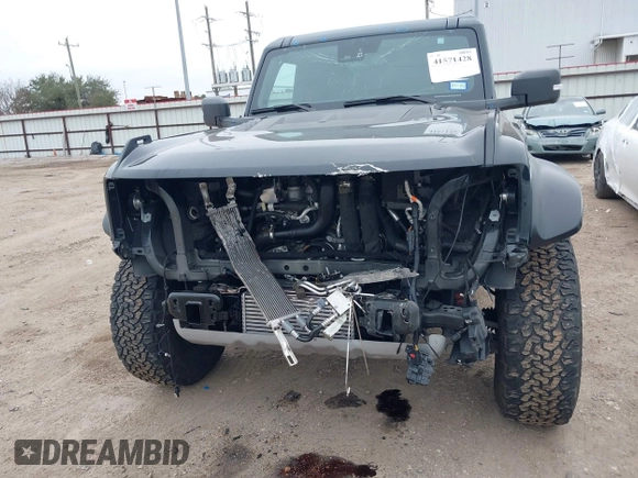 2023 Ford Bronco Raptor with VIN 1FMEE5JR0PLB23237, listed as a IAAI auction lot 41571428 with 25,530 mi miles. Bid and sale history available at carsss.com. Image 13.