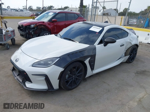 2022 Toyota GR86 with VIN JF1ZNBC13N8758065, listed as a IAAI auction lot 42030056 with 30,436 mi miles. Bid and sale history available at carsss.com. Image 2.