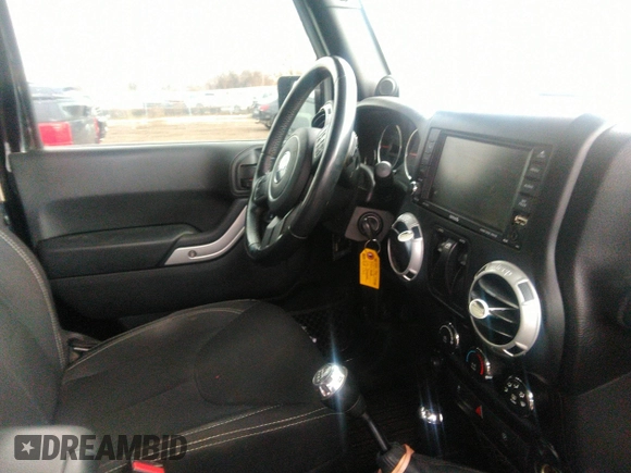 2014 Jeep Wrangler Sahara with VIN 1C4AJWBG9EL161712, listed as a IAAI auction lot 41839193 with 68,318 mi miles and . Bid and sale history available at DreamBid. Image 5.