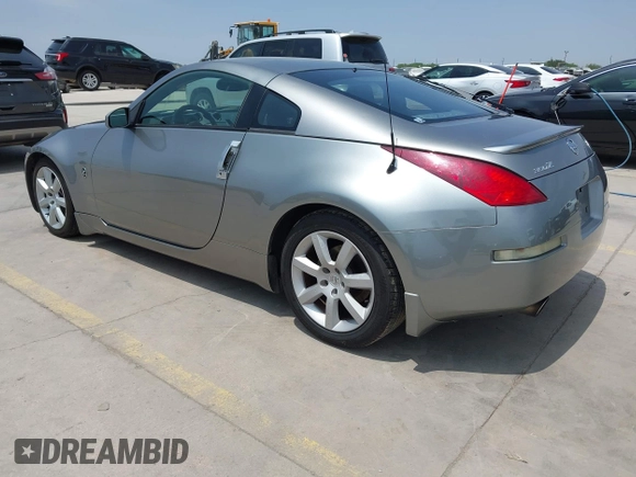 2003 Nissan 350Z Touring with VIN JN1AZ34D33T112077, listed as a IAAI auction lot 42305802 with 202,770 mi miles and . Bid and sale history available at DreamBid. Image 3.