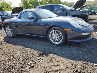 2011 Porsche Boxster with VIN WP0CA2A86BS710649, listed as a Copart auction lot 70280174 with 100,401 mi miles and Salvage Title. Bid and sale history available at carsss.com. Image 4.