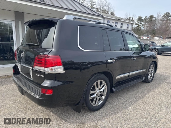 2013 Lexus LX 570 with VIN JTJHY7AX9D4126420, listed as a IAAI auction lot 41794133 with 156,035 mi miles and . Bid and sale history available at DreamBid. Image 4.