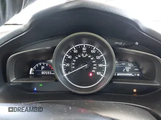 2018 Mazda 3 Touring z VIN 3MZBN1L37JM201797, wystawiony jako IAAI lot #42258756 z przebiegiem 80 593 mil mil oraz . Historia ofert i sprzedaży dostępna na DreamBid. Obrazek 7.